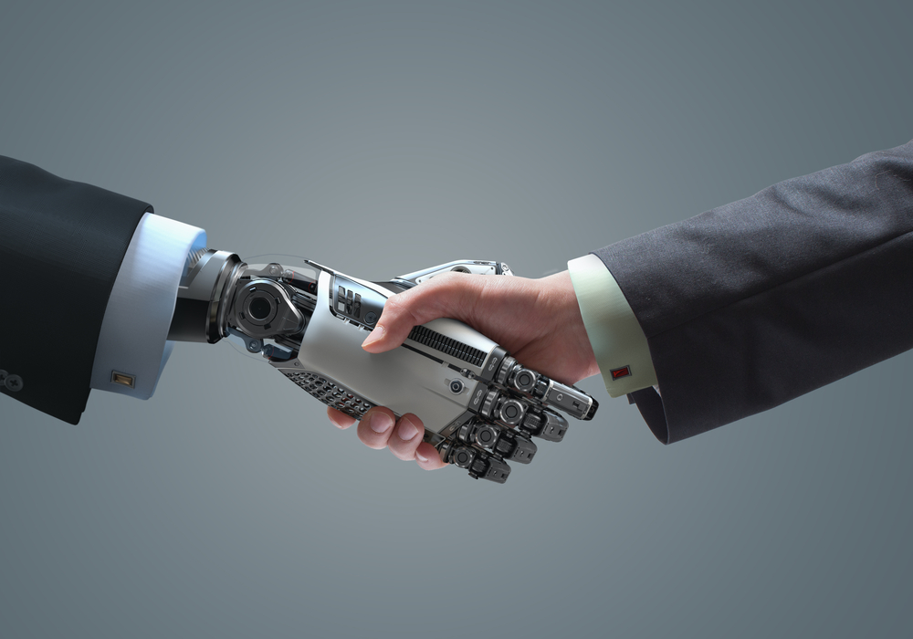 a robot hand and a human hand in a handshake amid the possible reality of a robot CEO in the future