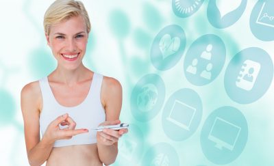 roche acquires mysugr, image of woman testing blood sugar for diabetes
