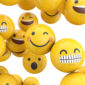 smiley face emojis on yellow balls