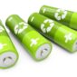 a photo of four green batteries
