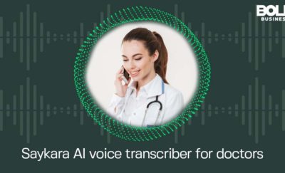Doctor speaking into phone - app powered by ai transcription service.