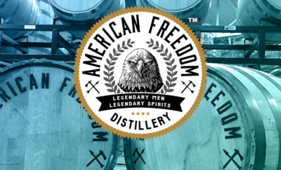 American Freedom logo overlay photo of American Freedom distillery barrels