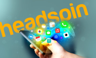 Headspin Inc. logo with apps coming out of the smartphone