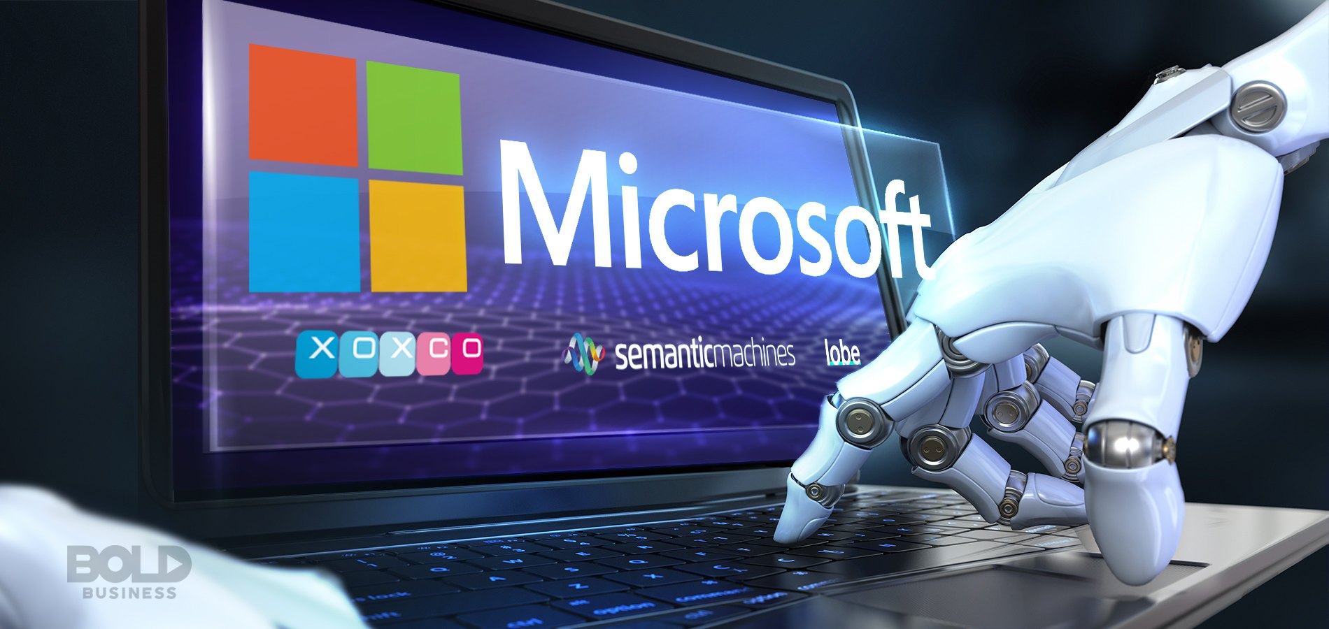 A photo of a robot hand typing on a laptop keyboard with the logo of Microsoft on the screen amidst Microsoft's recent acquisitions