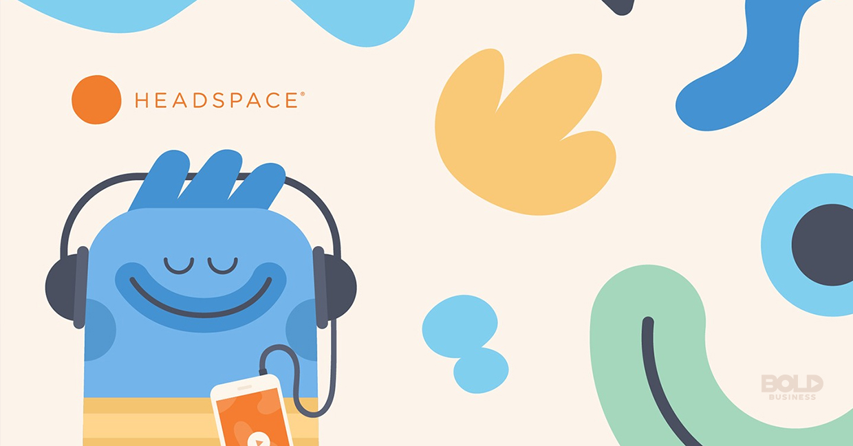 the Headspace meditation app graphic character listening to the app with its earphones and phone a photo of the Headspace meditation app graphic character listening to the app with its earphones and phone
