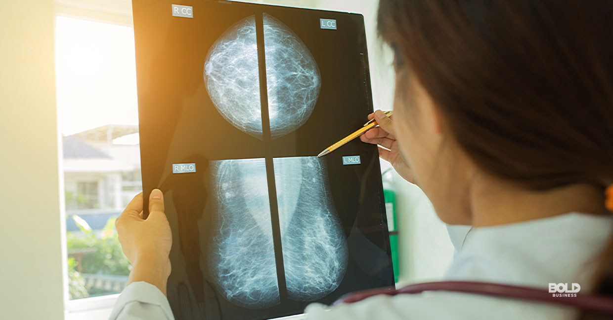 a doctor looking at a mammogram