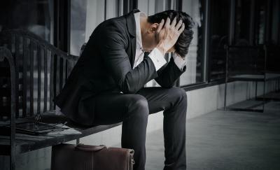 An entrepreneur looking depressed