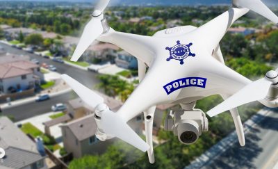 A close-up of a police drone in the air