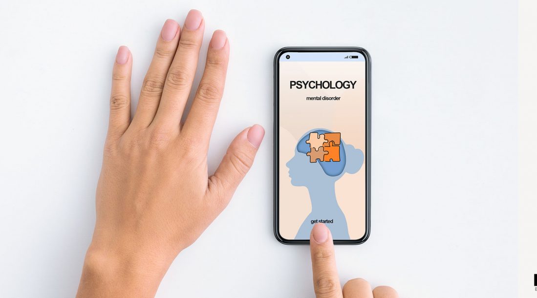 The-Mental-Health-Apps-Business-Revisited-Featured-IV Someone using a mental health up for their depressed hand
