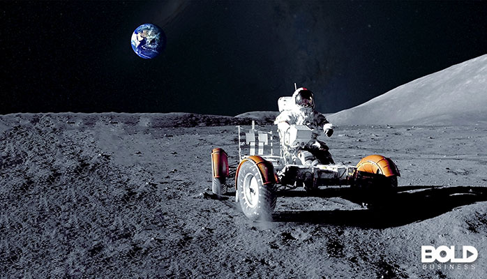 A dude driving his buggy around the moon like a champ