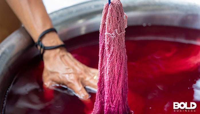 Someone dyeing something red