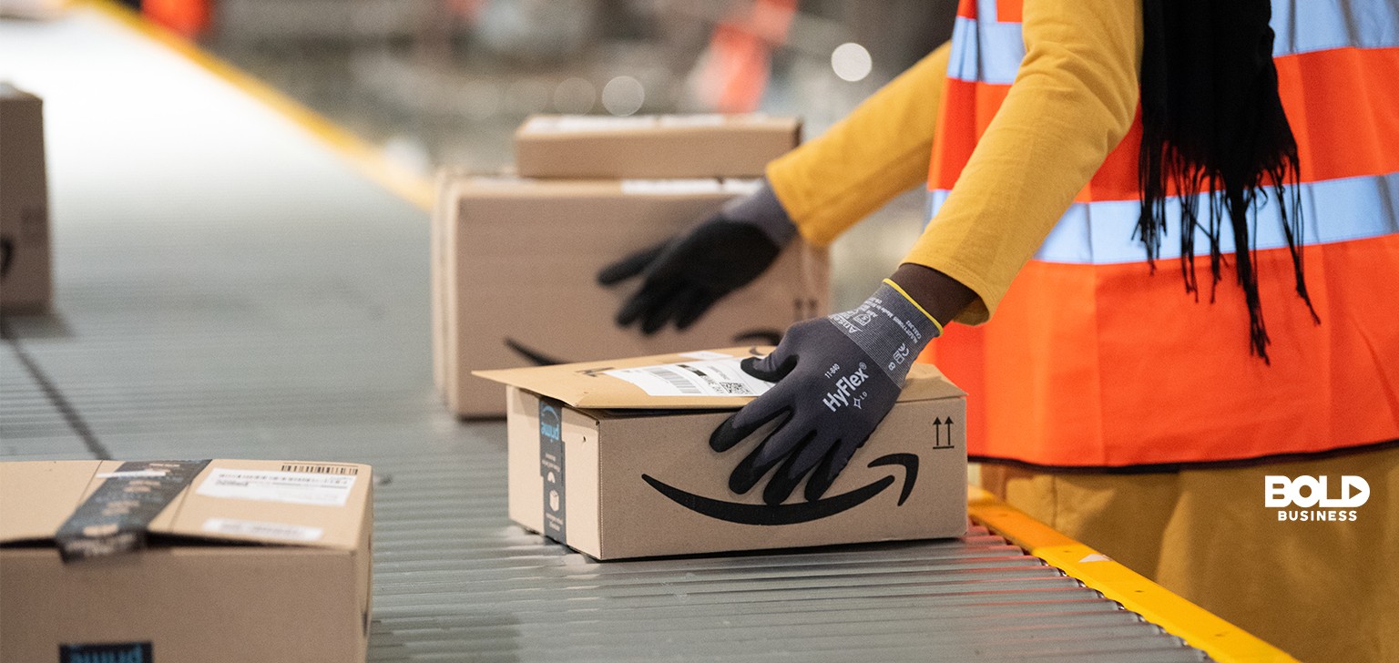 A worker handling Amazon packages