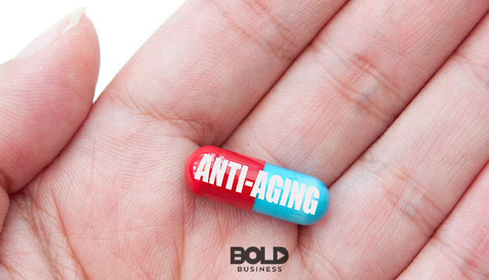 Someone holding an anti-aging pill?