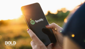 Someone using the Spotify app during the latest tech layoffs