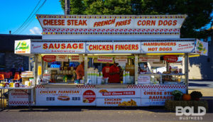 A street vendor being a cash-based business and selling sausages