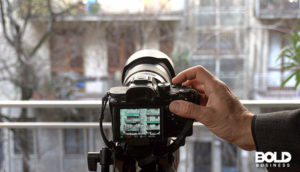 interior design influencers pointing camera outside