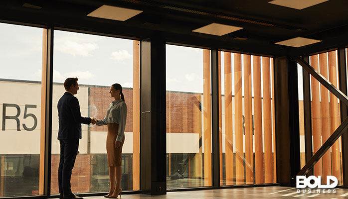 some people making a deal in an empty office