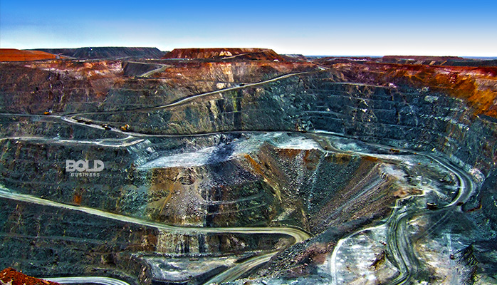 a big hole in the ground as a result of searching for rare earth elements
