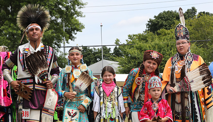 a bunch of Indians at a powwow