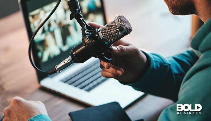 a dude talking into a mic for his podcast