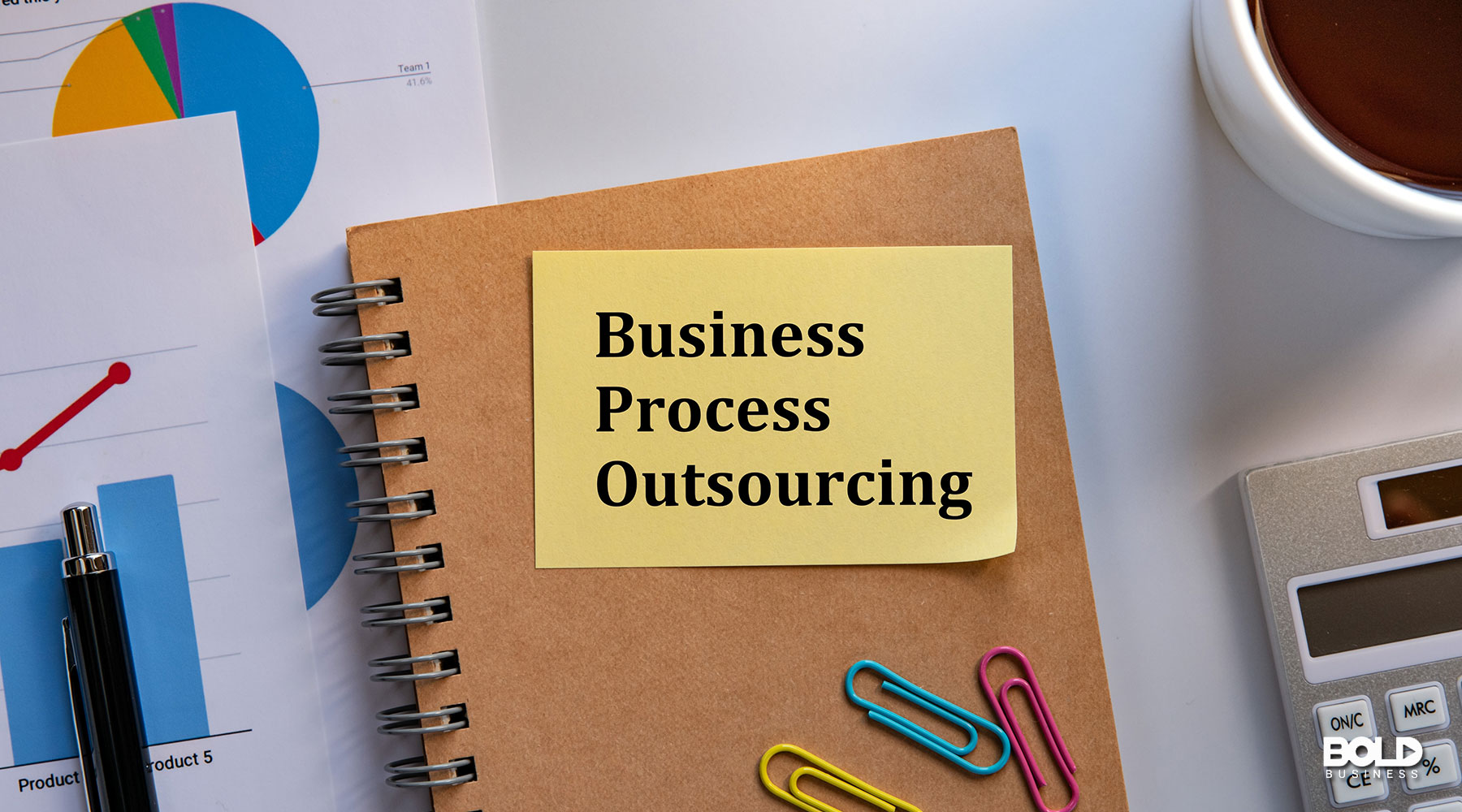 a notebook listing the benefits of business process outsourcing